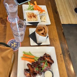 Tavern+Bowl East Village - Tavern Wings Roasted Garlic Hummus (V) onion rings