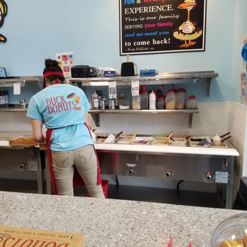 Duck Donuts - Adding the toppings - Donuts Near Me - Asheville, North Carolina Duck Donuts - Adding the toppings - Donuts Near Me - Asheville, North Carolina