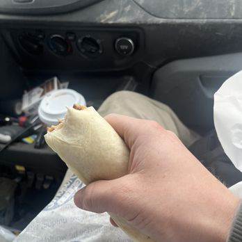 Skyline Chili - a person holding a burrito in a car - Fast Food Near Me - Taylor Mill, Kentucky Skyline Chili - a person holding a burrito in a car - Fast Food Near Me - Taylor Mill, Kentucky