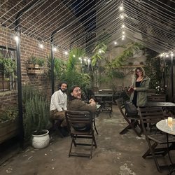 Dada - NYC writers at Dada Literary Café (Constantine Jones, Danielle Blau, Mani Tehranchi) taking a break at Dada's backyard
