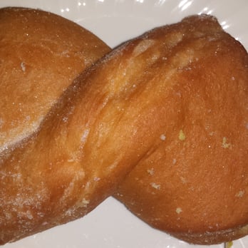 Cinco de Mayo Bakery - I'm not sure what this twisty thing is, but it's AWESOME.  Very simple: a light, fluffy bread coated in sugar--that's it. - Bakeries Near Me - Aurora, Illinois