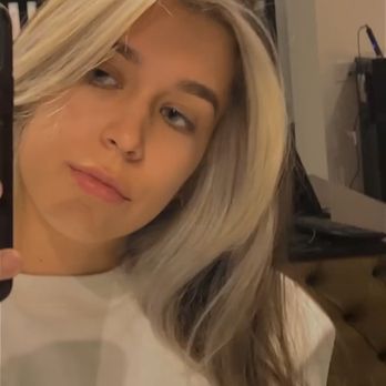 Tangles Salon - "Peek a Boo" with white blonde money piece with dark brown. - Hair Stylists Near Me - Rancho Cucamonga, California