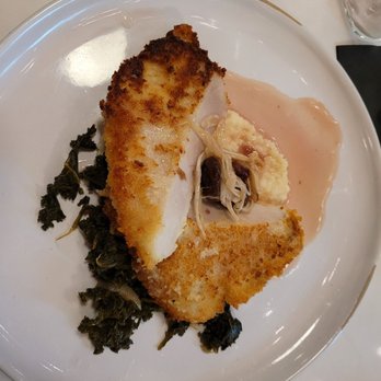 Clyde's Fine Diner - Pork Malenese with kale and polenta. The outside of the pork is crispy, and the pork itself tender and juicy. The polenta was great. - Diners Near Me - Des Moines, Iowa