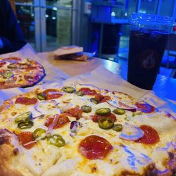 BLAZE PIZZA - Classic dough with white cream sauce, mozzarella, jalapeños, onions, & pepperonis BLAZE PIZZA - Classic dough with white cream sauce, mozzarella, jalapeños, onions, & pepperonis