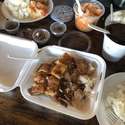 Front and center:  Lechon 1lb.  At 1 o'clock: Atchara.  At 2 o'clock Dinuguan.