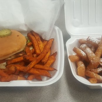 The Dive N - Grill chicken sammich with sweet potato fries. Dessert to the right. - Diners Near Me - Pineville, North Carolina The Dive N - Grill chicken sammich with sweet potato fries. Dessert to the right. - Diners Near Me - Pineville, North Carolina