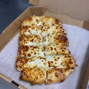 Treve's Pizza - a cheesy pizza in a box - Pizza Near Me - Brown City, Michigan Treve's Pizza - a cheesy pizza in a box - Pizza Near Me - Brown City, Michigan