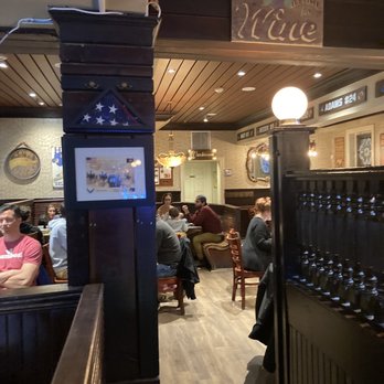 Klondike Kate's - people sitting at tables in a restaurant - Bars Near Me - Newark, Delaware