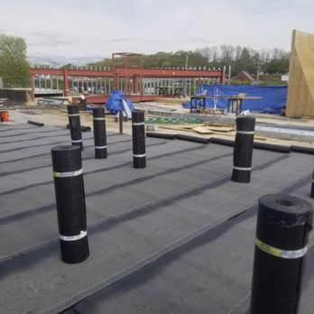 Eli & Sons Roofing - Laying down - Roofing Near Me Eli & Sons Roofing - Laying down - Roofing Near Me