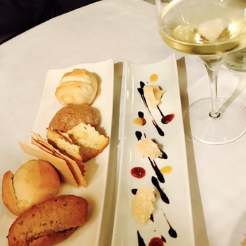 L'Evangelista - Complimentary warm bread and a plate of 'kitchen welcome Parmesan cheese' - Vegan Near Me - Verona, VR