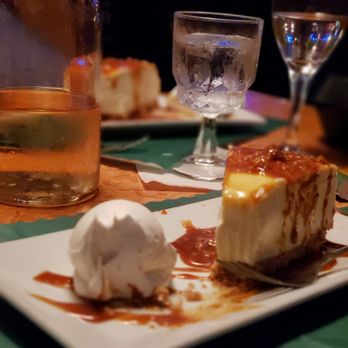 Oliva's Bar & Restaurant - Pardon the bite off the end. Salted Caramel Cheesecake on a Pretzel crust. Couldn't wait to take picture before trying this deliciousness - Italian Near Me - Mishawaka, Indiana Oliva's Bar & Restaurant - Pardon the bite off the end. Salted Caramel Cheesecake on a Pretzel crust. Couldn't wait to take picture before trying this deliciousness - Italian Near Me - Mishawaka, Indiana