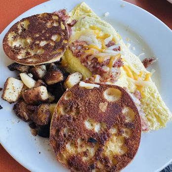 West Side Diner - Corn beef hash omelet with a grilled English muffin and well-done home fries - Diners Near Me - Providence, Rhode Island