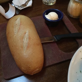 The Old Spaghetti Factory - Fresh loaf of bread and garlic butter - Italian Near Me - Phoenix, Arizona The Old Spaghetti Factory - Fresh loaf of bread and garlic butter - Italian Near Me - Phoenix, Arizona