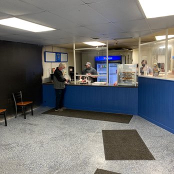 Bucks Pizzeria - a man standing at the counter - Pizza Near Me - Chittenango, New York Bucks Pizzeria - a man standing at the counter - Pizza Near Me - Chittenango, New York