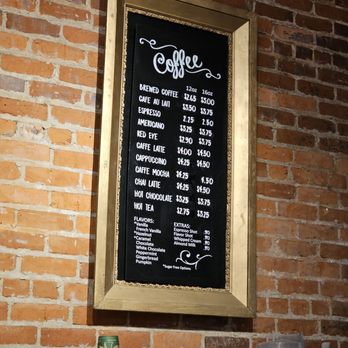 On the Rise Bread - The Coffees Menu framed in a gold frame hangs from the wall. - Bakeries Near Me - Roanoke, Virginia