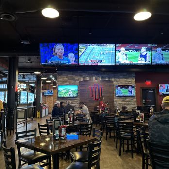 The District Tap Downtown - Plentiful TVs throughout sports bar - American Near Me - Indianapolis, Indiana The District Tap Downtown - Plentiful TVs throughout sports bar - American Near Me - Indianapolis, Indiana