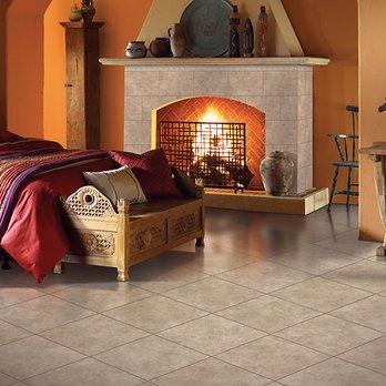 Value Carpet & More - a bedroom with a fireplace - Flooring Near Me - Ferndale, Michigan Value Carpet & More - a bedroom with a fireplace - Flooring Near Me - Ferndale, Michigan