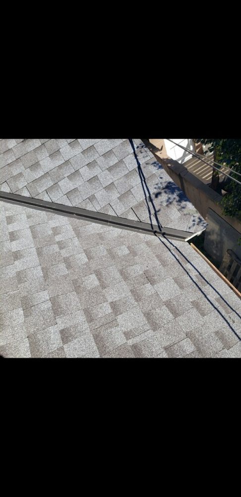 Slide of MTZ Roofing & Gutters