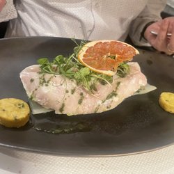 Grand Barrail - My john dory confit. Never heard of this fish but this was delicious. Perfectly cooked. Amazing light sauce. Fantastic meal