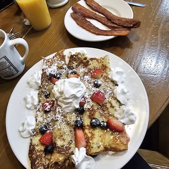 Midwest Breakfast Co. - a plate of french toast with berries and whipped cream - Breakfast & Brunch Near Me - Spring Grove, Illinois