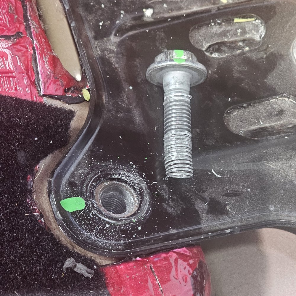 A Arrow Alignment - Rt upper strut mount bolt showing stripped out threads. 3 other bolts holding very tight. - Auto Repair Near Me - Las Vegas, Nevada A Arrow Alignment - Rt upper strut mount bolt showing stripped out threads. 3 other bolts holding very tight. - Auto Repair Near Me - Las Vegas, Nevada