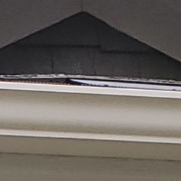 This photo shows the raindrop is not flush.  Now moisture will be able to get under my shingle.