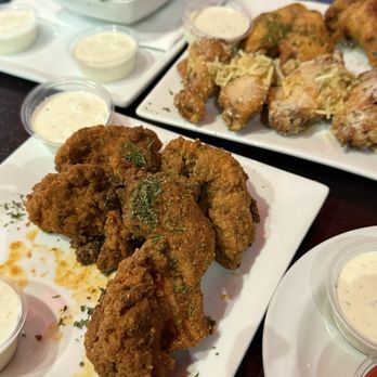The District By GS - FRIED BROCCOLI (back) Cajun chicken strips Lemon pepper wings Garlic parm wings - Bars Near Me - Los Angeles, California