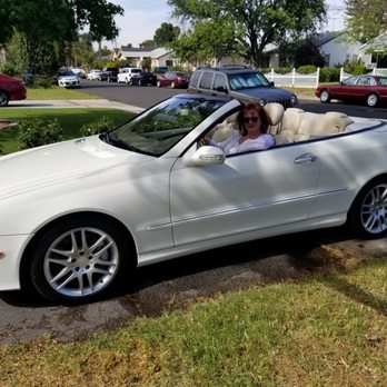 Leading Auto Transport - Client enjoying her new ride being delivered! - Vehicle Shipping Near Me - Norcross, Georgia Leading Auto Transport - Client enjoying her new ride being delivered! - Vehicle Shipping Near Me - Norcross, Georgia