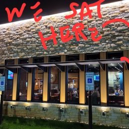 we've got here sign on the side of a restaurant