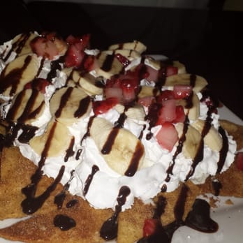 Rosalva's - Ice cream nachos: cinnamon flour chips with vanilla ice cream, whipped cream, bananas, chocolate syrup and strawberries.Amazing! - Mexican Near Me - Skyforest, California Rosalva's - Ice cream nachos: cinnamon flour chips with vanilla ice cream, whipped cream, bananas, chocolate syrup and strawberries.Amazing! - Mexican Near Me - Skyforest, California