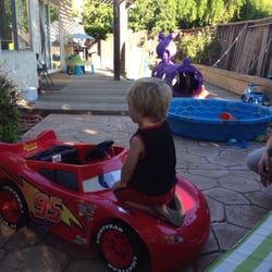 Shop Heroic Wholesale Outlet - Concord - Lil man admiring his lighting McQueen car
