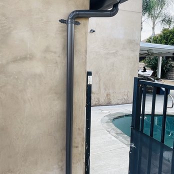QBE Gutters - Deco straps on 3" round downspout - Gutter Services Near Me