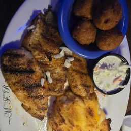 Grilled tilapia good seasoning and flavorful! Would order again! Shares entree with my partner the portions are plentiful!