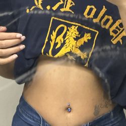 Prestige Tattoo - Feelin the bluesbelly piercing