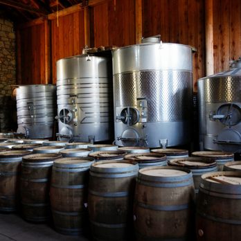 Seavey Vineyard - rows of wine barrels in a cellar - Wineries Near Me - Saint Helena, California Seavey Vineyard - rows of wine barrels in a cellar - Wineries Near Me - Saint Helena, California