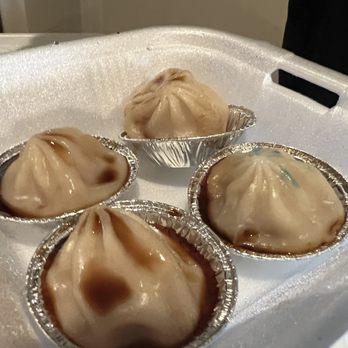 Dim Sum Box SG - Crystal leek dumplings (one of them is blue from the vinegar container ink marking) - Dim Sum Near Me - San Gabriel, California Dim Sum Box SG - Crystal leek dumplings (one of them is blue from the vinegar container ink marking) - Dim Sum Near Me - San Gabriel, California