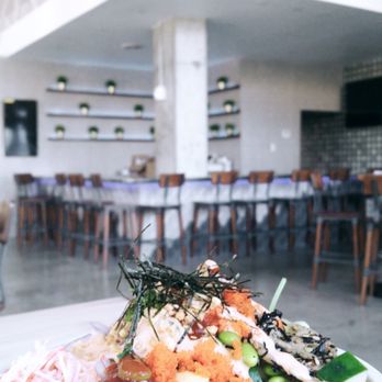Poki DC - $12.19 and worth it. 2 protein (marinated tuna and spicy tuna) on half zucchini + spring mix with all of the things - Poke Near Me - Rockville, Maryland