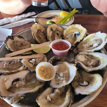 Half Shell Raw Bar - Raw oysters with horseradish and cocktail sauce - Seafood Near Me - Key West, Florida Half Shell Raw Bar - Raw oysters with horseradish and cocktail sauce - Seafood Near Me - Key West, Florida