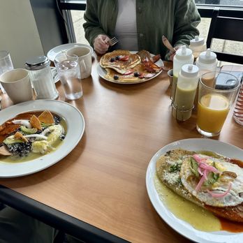 Buenos Días Mexican Cuisine - Left- huevos divorcidads back middle- pancakes and right- breakfast hurache - New Mexican Cuisine Near Me - Vancouver, Washington