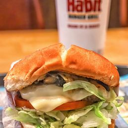 a burger and a drink a burger and a drink