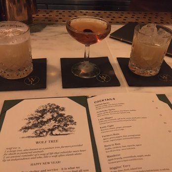 Wolf Tree - two cocktails and a menu on a table - Cocktail Bars Near Me - Hartford, Vermont