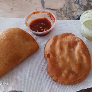 Teque chamos - Empanada on the left. Two sauces. - Empanadas Near Me - Boise, Idaho Teque chamos - Empanada on the left. Two sauces. - Empanadas Near Me - Boise, Idaho