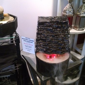 Silk Road Traveler - Smoking fountain on the right.  Rotating ball on the left. - Gift Shops Near Me - Blue Ridge, Georgia