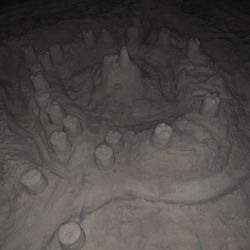 Elizabeth Baker - Evolution Travel - Inlet Beach Nighttime Sand Castle
