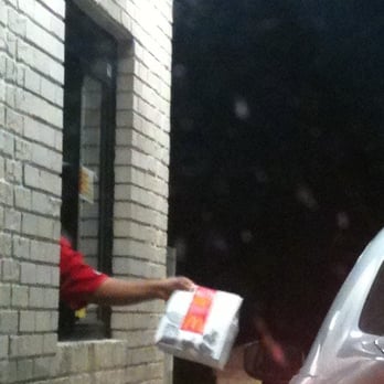 McDonald's - a man handing a package to a car - Fast Food Near Me - Sylvester, Georgia McDonald's - a man handing a package to a car - Fast Food Near Me - Sylvester, Georgia