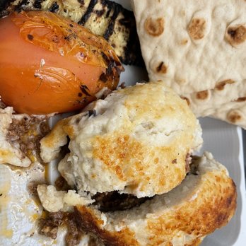 Petra Cafe - a plate of food including an egg and a biscuit - Greek Near Me - Orinda, California Petra Cafe - a plate of food including an egg and a biscuit - Greek Near Me - Orinda, California