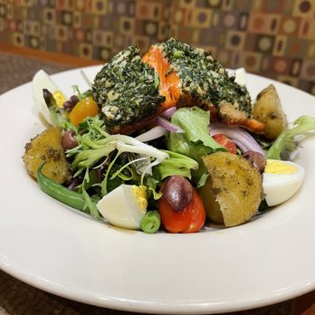 Bazille at Nordstrom - a white plate with a salad on it - New American Near Me - Boca Raton, Florida Bazille at Nordstrom - a white plate with a salad on it - New American Near Me - Boca Raton, Florida