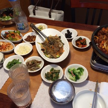 Pine Tree House - Middle: Japchae Far right: Ossum Bolgogi: squid, vegetables, pork. When done, the gravy is used to make kimchi fried rice infront of you! - Korean Near Me - Sacramento, California