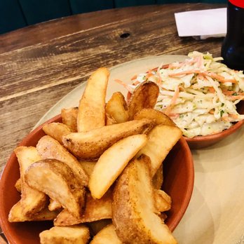 Nando's Peri-Peri - Sides : Potato Wedges / Coleslaw - Portuguese Near Me - New Westminster, British Columbia Nando's Peri-Peri - Sides : Potato Wedges / Coleslaw - Portuguese Near Me - New Westminster, British Columbia