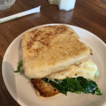 Artifact Coffee - riddled english muffin with egg whites, cheddar, and spinach. Good but not the best thing there - Cafes Near Me - Baltimore, Maryland